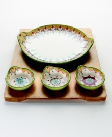 Garnish your party with the sunny botanicals of the Catalina collection from Vida by Eva Mendes dinnerware. The dishes are drenched in soft yellows and tangerine, sky blue and pale green. This hand-painted serveware invites guests to dip and drizzle snacks in three different flavors. A bamboo serving tray keeps everything in its place. Garnish your party with the sunny botanicals of the Catalina collection from Vida by Eva Mendes dinnerware. The dishes are drenched in soft yellows and tangerine, sky blue and pale green. This hand-painted serveware invites guests to dip and drizzle snacks in three different flavors. A bamboo serving tray keeps everything in its place.