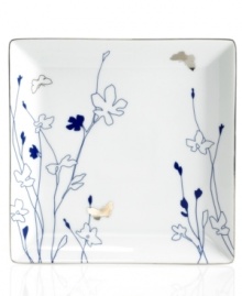 Platinum butterflies flit about indigo-blue blooms, adding whimsical glow to the Silhouette Indigo square accent plate. A banded edge adds a classic touch to a dinnerware pattern with modern spirit.