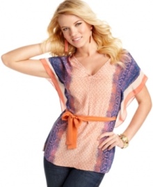 Soft batwing sleeves add a touch of drama to this vibrant, mixed-print top from GUESS?. Pair the style with your favorite skinny jeans for a colorful day look! Soft batwing sleeves add a touch of drama to this vibrant, mixed-print top from GUESS?. Pair the style with your favorite skinny jeans for a colorful day look!
