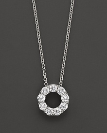 A lovely diamond circle pendant necklace in diamond and 14 Kt. white gold.