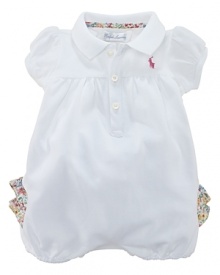 Classic cotton mesh is transformed into an adorable bubble that is embellished with a rear waist ruffled trim in a whimsical floral print. Classic cotton mesh is transformed into an adorable bubble that is embellished with a rear waist ruffled trim in a whimsical floral print.