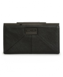 Sophisticated and stylish. This refined wallet by Kenneth Cole Reaction features an all-over slight sheen, signature plaque at front and sleek kiss lock closure. Sophisticated and stylish. This refined wallet by Kenneth Cole Reaction features an all-over slight sheen, signature plaque at front and sleek kiss lock closure.