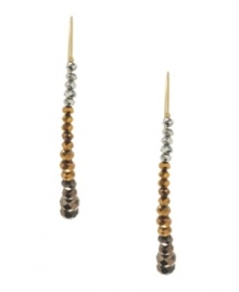 Simple yet sophisticated. Kenneth Cole New York's pull-through linear drop earrings yield effortless elegance. Crafted in a combination of gold tone, bronze tone and silver tone mixed metal, they're adorned with an array of sparkling beads. Approximate drop: 2-1/4 inches. Simple yet sophisticated. Kenneth Cole New York's pull-through linear drop earrings yield effortless elegance. Crafted in a combination of gold tone, bronze tone and silver tone mixed metal, they're adorned with an array of sparkling beads. Approximate drop: 2-1/4 inches.