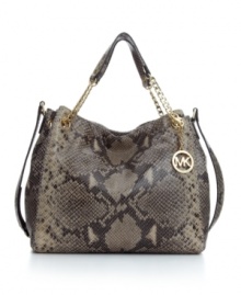 Dramatically sleek, this glazed, embossed python purse from MICHAEL Michael Kors offers classic elegance in all its effortlessness.