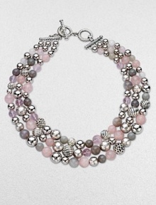 From the Elements Collection. A triple strand of bold beads combines sterling silver, rose quartz, grey chalcedony and grey moonstone in an artful union of rich textures, varied sizes and soft shades.Rose quartz, grey chalcedony and grey moonstoneSterling silverLength, about 18Cable toggle claspImported From the Elements Collection. A triple strand of bold beads combines sterling silver, rose quartz, grey chalcedony and grey moonstone in an artful union of rich textures, varied sizes and soft shades.Rose quartz, grey chalcedony and grey moonstoneSterling silverLength, about 18Cable toggle claspImported