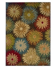 Inspired by classic floral designs of the Sixties, the Tribecca area rug presents an eye-catching layout coupled with divine color. Its streamlined, low-cut pile and durable construction offer a handsome, lasting finish to any room. (Clearance)