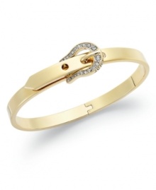 Buckle up for fierce fashion. This Juicy Couture bangle bracelet boasts a horseshoe-shaped adjustable buckle embellished with pave crystal accents. Finished with a single glass cubic zirconia. Crafted in gold tone mixed metal. Approximate diameter: 2-1/4 inches. Buckle up for fierce fashion. This Juicy Couture bangle bracelet boasts a horseshoe-shaped adjustable buckle embellished with pave crystal accents. Finished with a single glass cubic zirconia. Crafted in gold tone mixed metal. Approximate diameter: 2-1/4 inches.