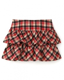 Perfect with a button down shirt, long sleeve tee or cardigan, this season-right Juicy Couture plaid skirt refreshes the classic style with tiered ruffle styling. Perfect with a button down shirt, long sleeve tee or cardigan, this season-right Juicy Couture plaid skirt refreshes the classic style with tiered ruffle styling.