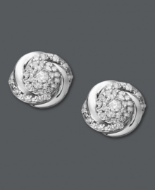 Add a special touch to any look. These subtly-shimmering studs by Wrapped in Love feature swirls of round-cut diamonds (1/4 ct. t.w.) set in polished sterling silver. Approximate diameter: 4/10 inch.