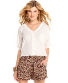 Modernize your warm-weather gear with this asymmetrical, back cutout blouse from Jessica Simpson! Modernize your warm-weather gear with this asymmetrical, back cutout blouse from Jessica Simpson!