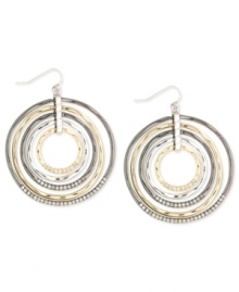 Round and resplendent. Nine West's orbital earrings are crafted from silver-tone, gold-tone and hematite-tone mixed metal to dazzling effect with glass crystal stones adding luster. With lever-back closure. Approximate drop: 2 inches. Approximate diameter: 1-7/8 inches.