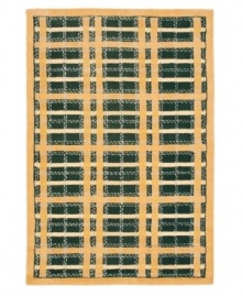 A traditional basketweave plaid is updated for the modern home in this area rug only from Martha Stewart rugs. Hand tufted in India of long wool fibers, this luxurious home accent presents unparalleled comfort and style underfoot. A traditional basketweave plaid is updated for the modern home in this area rug only from Martha Stewart rugs. Hand tufted in India of long wool fibers, this luxurious home accent presents unparalleled comfort and style underfoot.