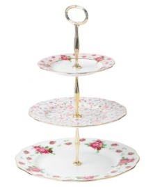 Revive a classic dinnerware pattern with the Vintage tiered cake plate. Lush blossoms plucked from Royal Doulton's Old Country Roses collection flower on white bone china with ruffled gold edges. Revive a classic dinnerware pattern with the Vintage tiered cake plate. Lush blossoms plucked from Royal Doulton's Old Country Roses collection flower on white bone china with ruffled gold edges.