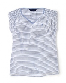 A stylish striped V-neck tee is crafted from soft cotton jersey and finished with smocked shoulders for a pretty look. A stylish striped V-neck tee is crafted from soft cotton jersey and finished with smocked shoulders for a pretty look.