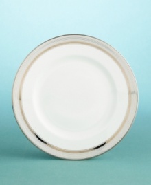 Ribbon Stripe is a cultured design inspired by a favorite Paris porcelain tea set. The original, crafted in the late-18th to early-19th century in the north of Paris, featured elaborate, figural hand-painting and lavish gilt accents. In this clean, modern version, varying widths of gilt and color banding create a design motif that is spare yet sophisticated, with concentric bands of silver circling the classically styled rims. Ribbon Stripe is a cultured design inspired by a favorite Paris porcelain tea set. The original, crafted in the late-18th to early-19th century in the north of Paris, featured elaborate, figural hand-painting and lavish gilt accents. In this clean, modern version, varying widths of gilt and color banding create a design motif that is spare yet sophisticated, with concentric bands of silver circling the classically styled rims.