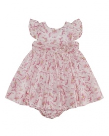 A charmingly traditional dress in crisp cotton features a dogwood floral pattern for a sweet summer look. A charmingly traditional dress in crisp cotton features a dogwood floral pattern for a sweet summer look.