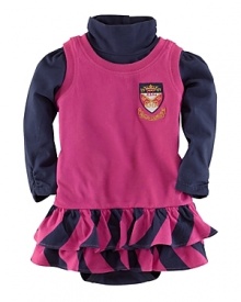 This jumper set pairs a sweet, boldly hued striped dress with an essential cotton jersey bodysuit. Cotton jersey jumper has a ribbed neckline and armholes and a two-button placket at the back for easy on and off. Features a drop waist and a striped ruffled hem. An embroidered Ralph Lauren and crown crest accent the chest. Cotton jersey bodysuit has a turtleneck. Long sleeves. Four buttons at the back placket and snaps at the hem for easy on and off. This jumper set pairs a sweet, boldly hued striped dress with an essential cotton jersey bodysuit. Cotton jersey jumper has a ribbed neckline and armholes and a two-button placket at the back for easy on and off. Features a drop waist and a striped ruffled hem. An embroidered Ralph Lauren and crown crest accent the chest. Cotton jersey bodysuit has a turtleneck. Long sleeves. Four buttons at the back placket and snaps at the hem for easy on and off.