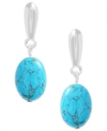 Try on a little turquoise. Kenneth Cole's silver-plated mixed metal earrings feature a stunning semi-precious turquoise oval drop with silver-tone detail at post backing. Approximate drop: 1-1/4 inches.