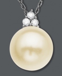 Poignant and polished. This simply stunning pendant features a cultured freshwater pearl (9 mm) accented by three, round-cut diamonds. Setting and chain crafted in 14k white gold. Approximate length: 18 inches. Approximate drop: 1/2 inch. Poignant and polished. This simply stunning pendant features a cultured freshwater pearl (9 mm) accented by three, round-cut diamonds. Setting and chain crafted in 14k white gold. Approximate length: 18 inches. Approximate drop: 1/2 inch.