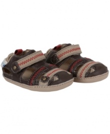 Strapped in and ready to go! He'll be up for anything in these stylish Robeez shoes designed for both comfort and muscle development. Strapped in and ready to go! He'll be up for anything in these stylish Robeez shoes designed for both comfort and muscle development.