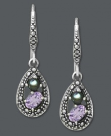 A true reflection of beauty. Genevieve & Grace's teardrop-shaped earrings combine a lovely mix of amethyst (3/4 ct. t.w.), abalone and marcasite for a sweet, sparkling mix. Crafted in sterling silver. Approximate drop length: 1-5/16 inches. Approximate drop width: 3/8 inch. A true reflection of beauty. Genevieve & Grace's teardrop-shaped earrings combine a lovely mix of amethyst (3/4 ct. t.w.), abalone and marcasite for a sweet, sparkling mix. Crafted in sterling silver. Approximate drop length: 1-5/16 inches. Approximate drop width: 3/8 inch.