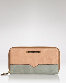 Compact style gets a touch of cool with this color blocked leather wallet from Rebecca Minkoff. On-trend and textured, this practical piece is almost too pretty to hide in your purse. Compact style gets a touch of cool with this color blocked leather wallet from Rebecca Minkoff. On-trend and textured, this practical piece is almost too pretty to hide in your purse.