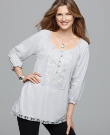 A peasant-style top, as pretty as can be, from RXB. Lace trim at the hemline gives it an extra feminine flourish!