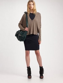 Featherweight Merino wool drapes loosely over the body and is finished with an asymmetrical ribbed hem.Scoopneck Dropped shoulders Dolman sleeves About 24 from shoulder to hem Merino wool Hand wash or dry clean Imported Featherweight Merino wool drapes loosely over the body and is finished with an asymmetrical ribbed hem.Scoopneck Dropped shoulders Dolman sleeves About 24 from shoulder to hem Merino wool Hand wash or dry clean Imported