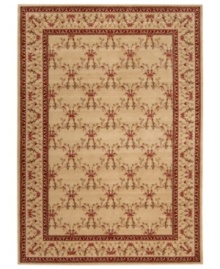 Outfit your home in old-world elegance. A wonderfully ornamental European-inspired motif with vines and blossoms gives this hand-carved wool rug a look of fine-tuned beauty. Soft and inviting in warm beige, the rug is an inspired choice for living areas and dining rooms.