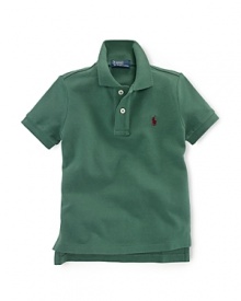 A classic polo shirt crafted from breathable cotton mesh is tailored in a short-sleeved silhouette for preppy, warm-weather style. A classic polo shirt crafted from breathable cotton mesh is tailored in a short-sleeved silhouette for preppy, warm-weather style.