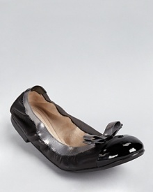 Trimmed in metallic, Salvatore Ferragamo's My Paris flats are slick in glossy patent leather.