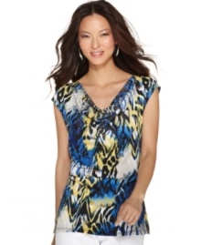 Lively colors and a bold ikat print get a spot of shine from shimmering studs on Style&co.'s top! Lively colors and a bold ikat print get a spot of shine from shimmering studs on Style&co.'s top!