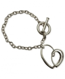 Make a heartfelt statement with this link charm bracelet from T Tahari. The bracelet, part of the Essentials Collection, is crafted from silver-tone mixed metal. Approximate length: 7-1/2 inches + 1-inch extender.