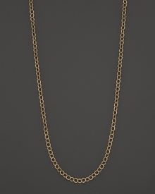 Gleaming oval links in 18K yellow gold. By Temple St. Clair.