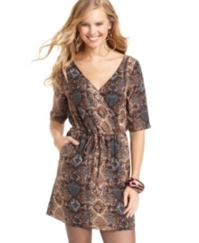Fierce for sure! Covered in animal-print and designed with a cool back cutout, Mimi Chica's short sleeve dress works perfectly for day or night. Fierce for sure! Covered in animal-print and designed with a cool back cutout, Mimi Chica's short sleeve dress works perfectly for day or night.
