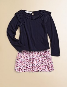 Channel her girly charm in this super-soft style defined by meandering ruffles. Scoopneck Long sleeves Keyhole closure on back 65% polyester/35% viscose Machine wash Imported Please note: Number of buttons may vary depending on size ordered Channel her girly charm in this super-soft style defined by meandering ruffles. Scoopneck Long sleeves Keyhole closure on back 65% polyester/35% viscose Machine wash Imported Please note: Number of buttons may vary depending on size ordered
