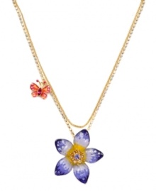 A floral sensation. Betsey Johnson breathes spring into any look with this pretty purple flower pendant. Crafted in gold-plated mixed metal with vibrant enamel and crystal accents. Approximate length: 16 inches + 3-inch extender. Approximate drop: 1-3/4 inches.