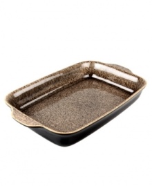 More than meets the eye, Denby's large Praline baking dish boasts standout durability in addition to style, whisking a piping hot pork roast or cheesy lasagna straight from oven to table. With a distinct silhouette in casual stoneware and unique speckled glaze. More than meets the eye, Denby's large Praline baking dish boasts standout durability in addition to style, whisking a piping hot pork roast or cheesy lasagna straight from oven to table. With a distinct silhouette in casual stoneware and unique speckled glaze.