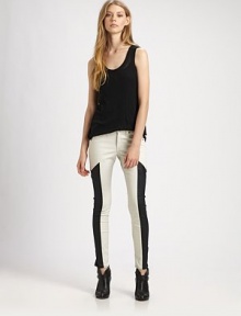 Shift into high-fashion gear with these leggings-style skinnies, defined by contrasting side panels that evoke a sporty vibe. THE FITRise, about 8Inseam, about 30THE DETAILSZip flyFive-pocket styleBody: Cotton/polyurethaneTrim: LeatherMachine washMade in USA of imported fabricModel shown is 5'11 (178cm) wearing US size 4. Shift into high-fashion gear with these leggings-style skinnies, defined by contrasting side panels that evoke a sporty vibe. THE FITRise, about 8Inseam, about 30THE DETAILSZip flyFive-pocket styleBody: Cotton/polyurethaneTrim: LeatherMachine washMade in USA of imported fabricModel shown is 5'11 (178cm) wearing US size 4.