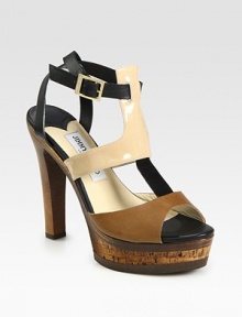 Patent leather and leather colorblock design with a t-strap and an earthy cork platform. Wooden heel, 5 (125mm)Cork platform, 1 (25mm)Compares to a 4 heel (100mm)Patent leather and leather upperLeather liningRubber solePadded insoleMade in ItalyOUR FIT MODEL RECOMMENDS ordering true size. 