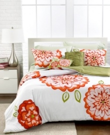 A beautiful garden of bright orange flowers bloom on a crisp white ground in this Amelie duvet cover set for a vibrant addition to your space. Comes complete with shams and two decorative pillows featuring coordinating florals and plush ruched texture.