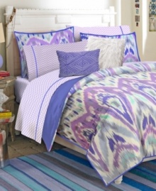Teen Vogue's Ikat Stripe decorative pillow pack completes the look with a fun shaggy texture and diamond design in coordinating hues. Teen Vogue's Ikat Stripe decorative pillow pack completes the look with a fun shaggy texture and diamond design in coordinating hues.