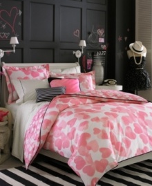 A flutter of sweet pink watercolor hearts accented with touches of stylish black details make the Teen Vogue Faded Hearts bedding a favorite for any romantic at heart.