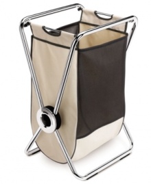A clothes case. A heavy-duty steel frame houses a breathable mesh & canvas bag that sorts & stores your dirty clothes and then quickly lifts out for easy carrying to the laundry room. The folding design lets you stow this hamper away when not in use, plus rubberized feet & a strong pivot point keep it standing even when its full. 5-year warranty. A clothes case. A heavy-duty steel frame houses a breathable mesh & canvas bag that sorts & stores your dirty clothes and then quickly lifts out for easy carrying to the laundry room. The folding design lets you stow this hamper away when not in use, plus rubberized feet & a strong pivot point keep it standing even when its full. 5-year warranty.