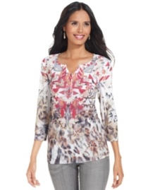 Style&co. is where the Southwest meets the savannahs: bold tribal patterns and animal prints combine to make one eye-catching henley! Style&co. is where the Southwest meets the savannahs: bold tribal patterns and animal prints combine to make one eye-catching henley!