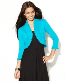 INC's petite cardigan makes a great top layer for any outfit! The ruffled details give this shrug a charming touch. INC's petite cardigan makes a great top layer for any outfit! The ruffled details give this shrug a charming touch.