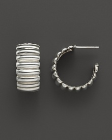 Wide, gleaming sterling silver hoop earrings from the John Hardy Bedeg collection. Wide, gleaming sterling silver hoop earrings from the John Hardy Bedeg collection.