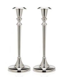 Cast your home in a more beautiful light with Godinger candlesticks. A classic tulip shape defines a polished aluminum pair to accentuate any setting.