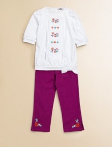 A charming short-sleeved top in soft cotton is accented with a blooming bouquet of embroidered flowers to inspire warm thoughts.Round necklineShort puff sleevesBack button closureTie hemCottonMachine washImported Please note: Number of buttons may vary depending on size ordered. A charming short-sleeved top in soft cotton is accented with a blooming bouquet of embroidered flowers to inspire warm thoughts.Round necklineShort puff sleevesBack button closureTie hemCottonMachine washImported Please note: Number of buttons may vary depending on size ordered.