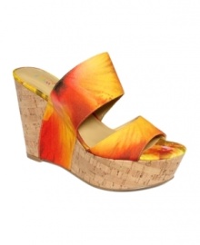 Stunning straps. Nine West's Larysa platform wedge sandals slide on comfortably and are super stylish too.